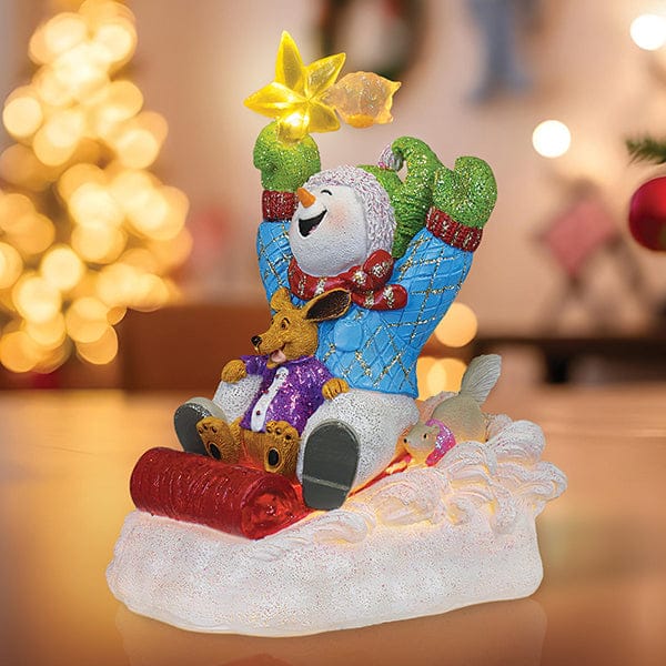 Old World Christmas 5.5 X 3.5 X 4.5 / 15501 Star Powered Snow Boy Lighted Figurine