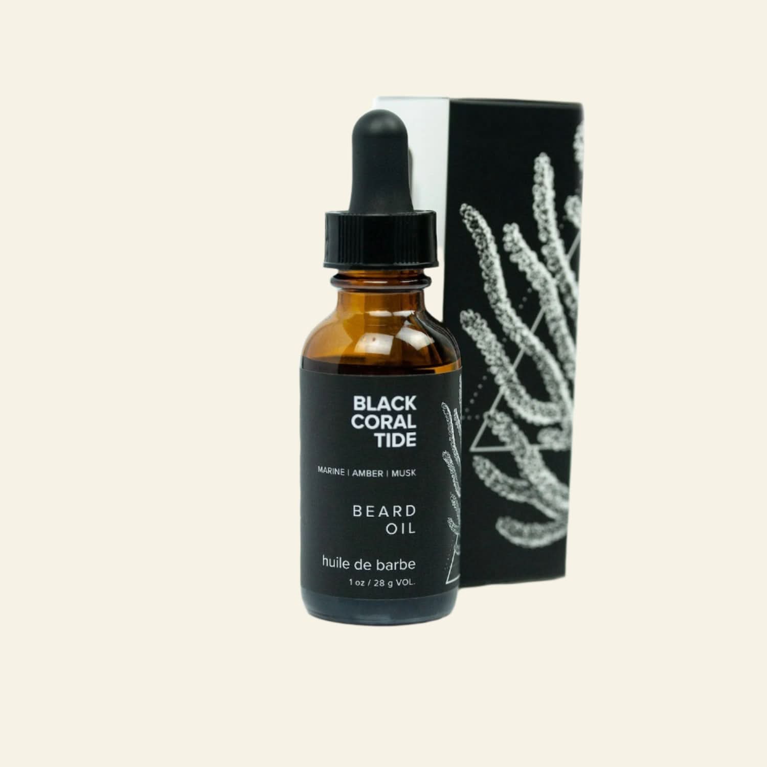Bottle of Black Coral Tide beard oil with a dropper and packaging on a white background