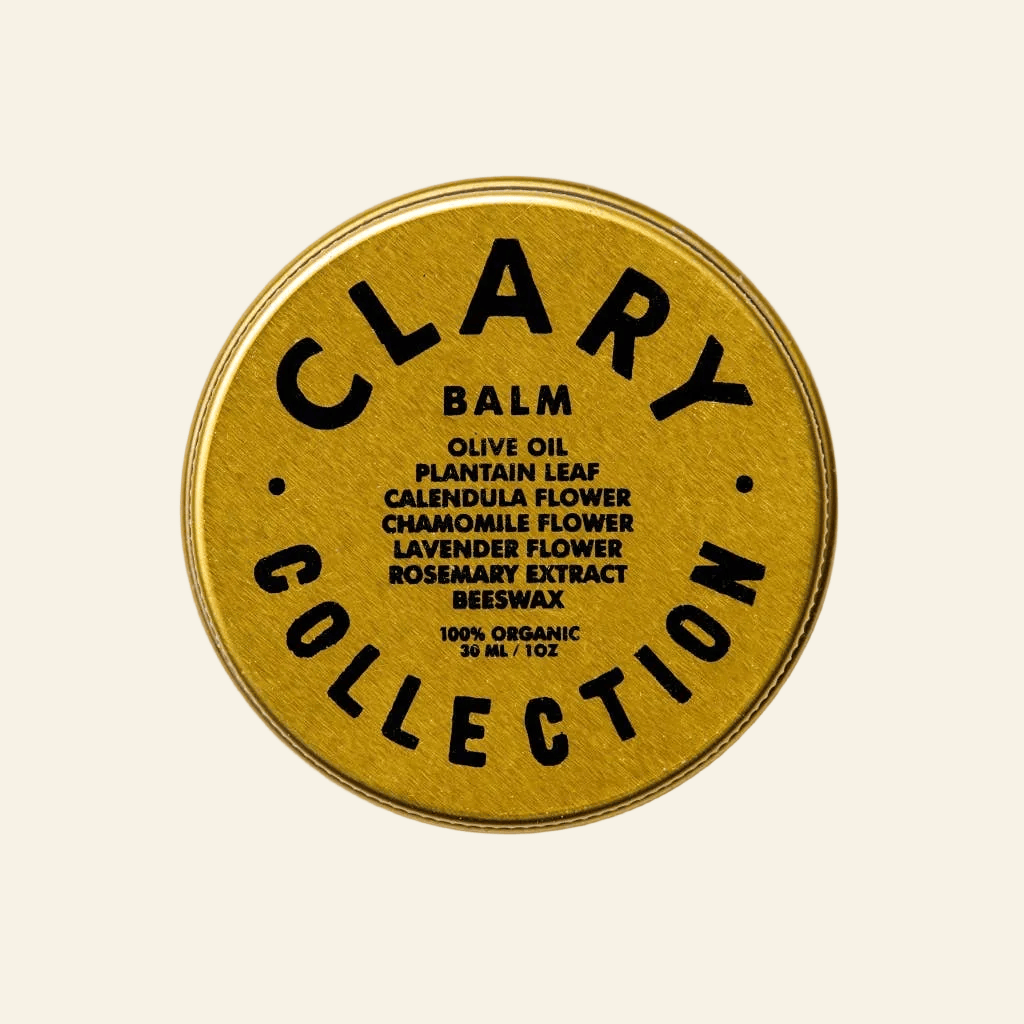 Clary Collection balm container with gold lid and black text on a white background