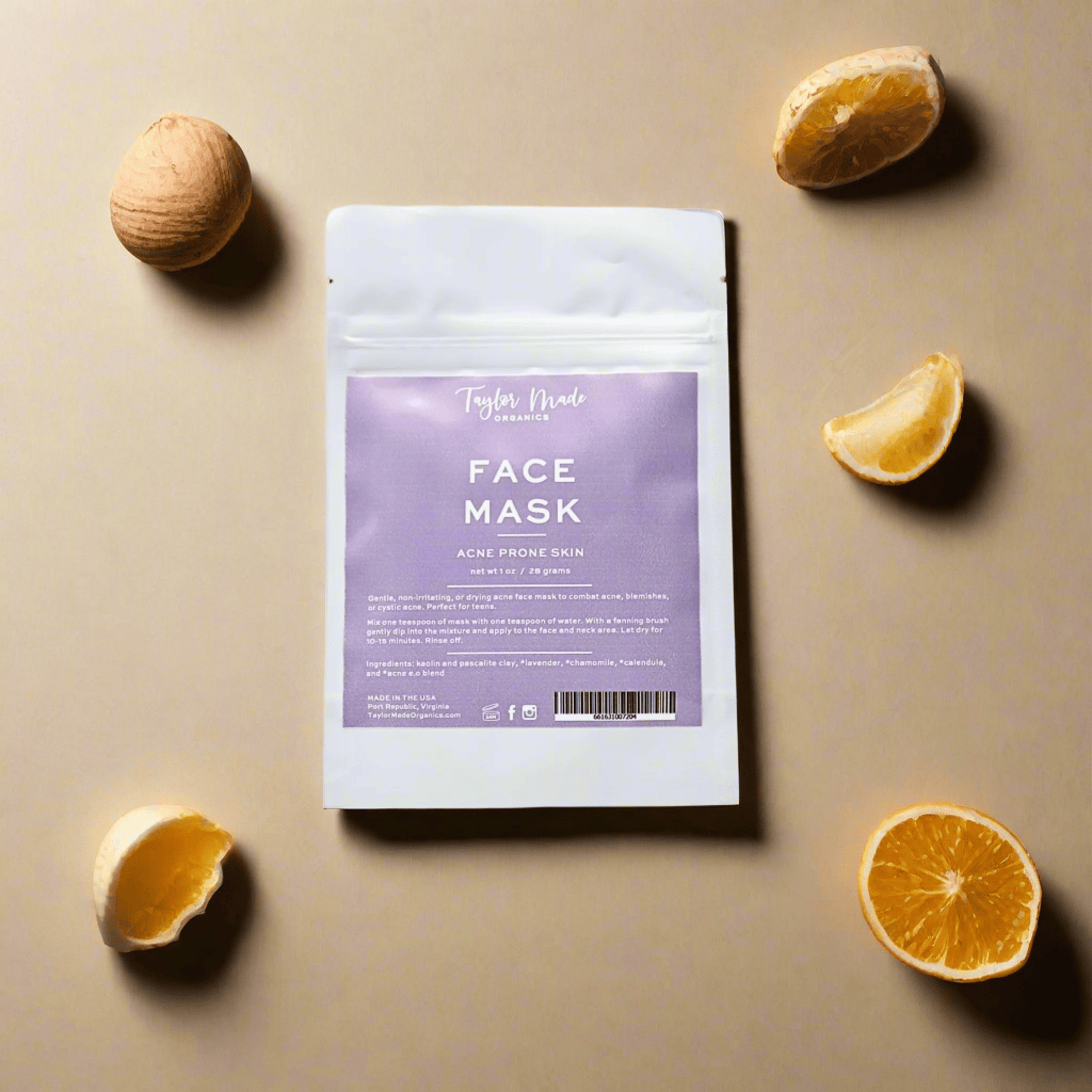 Face mask packaging with a purple label on a beige background