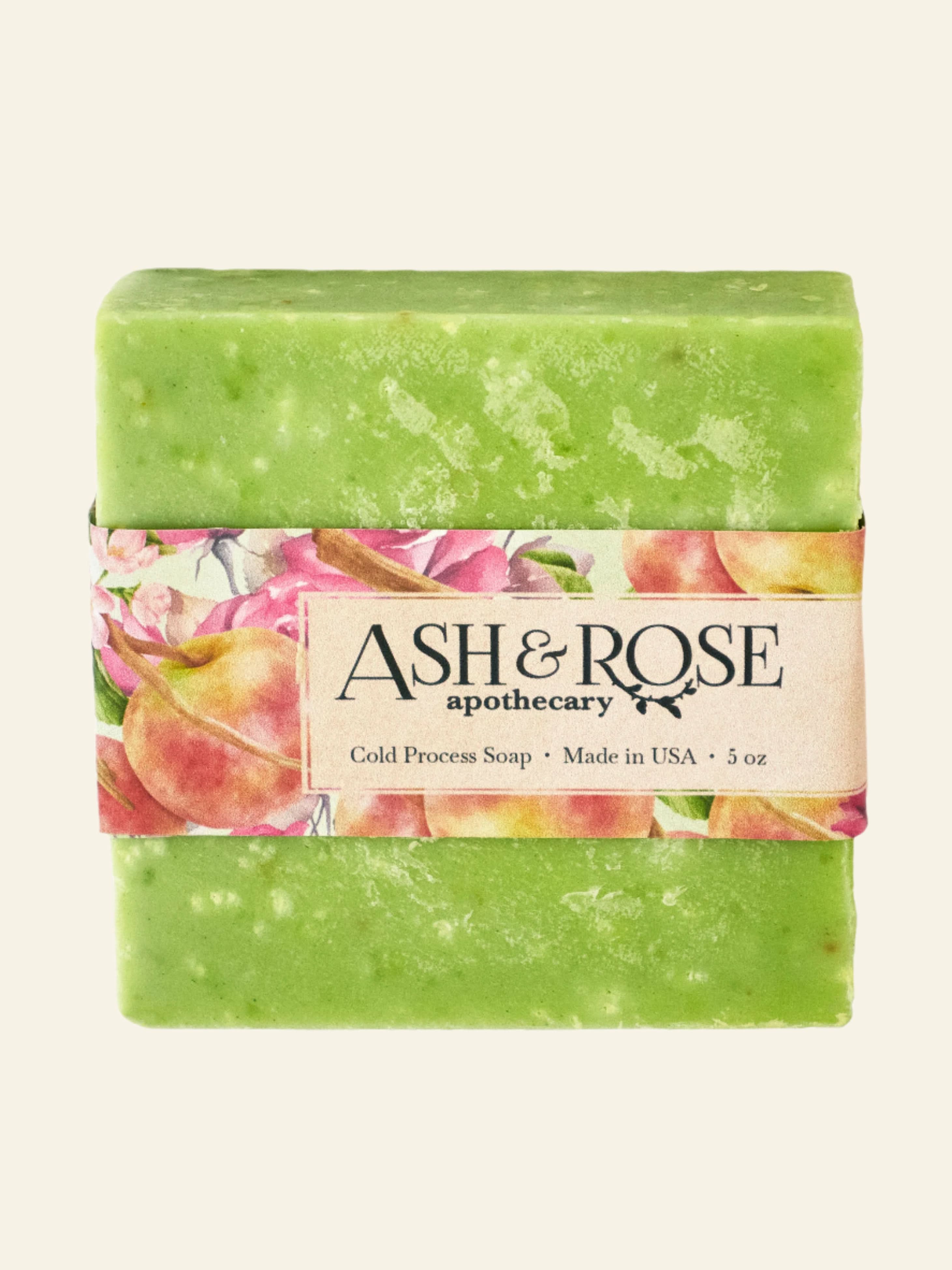 Green soap bar with a colorful label featuring the brand &