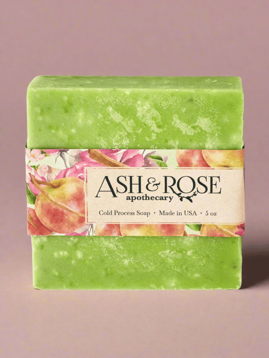Green soap bar with a colorful label featuring the brand &