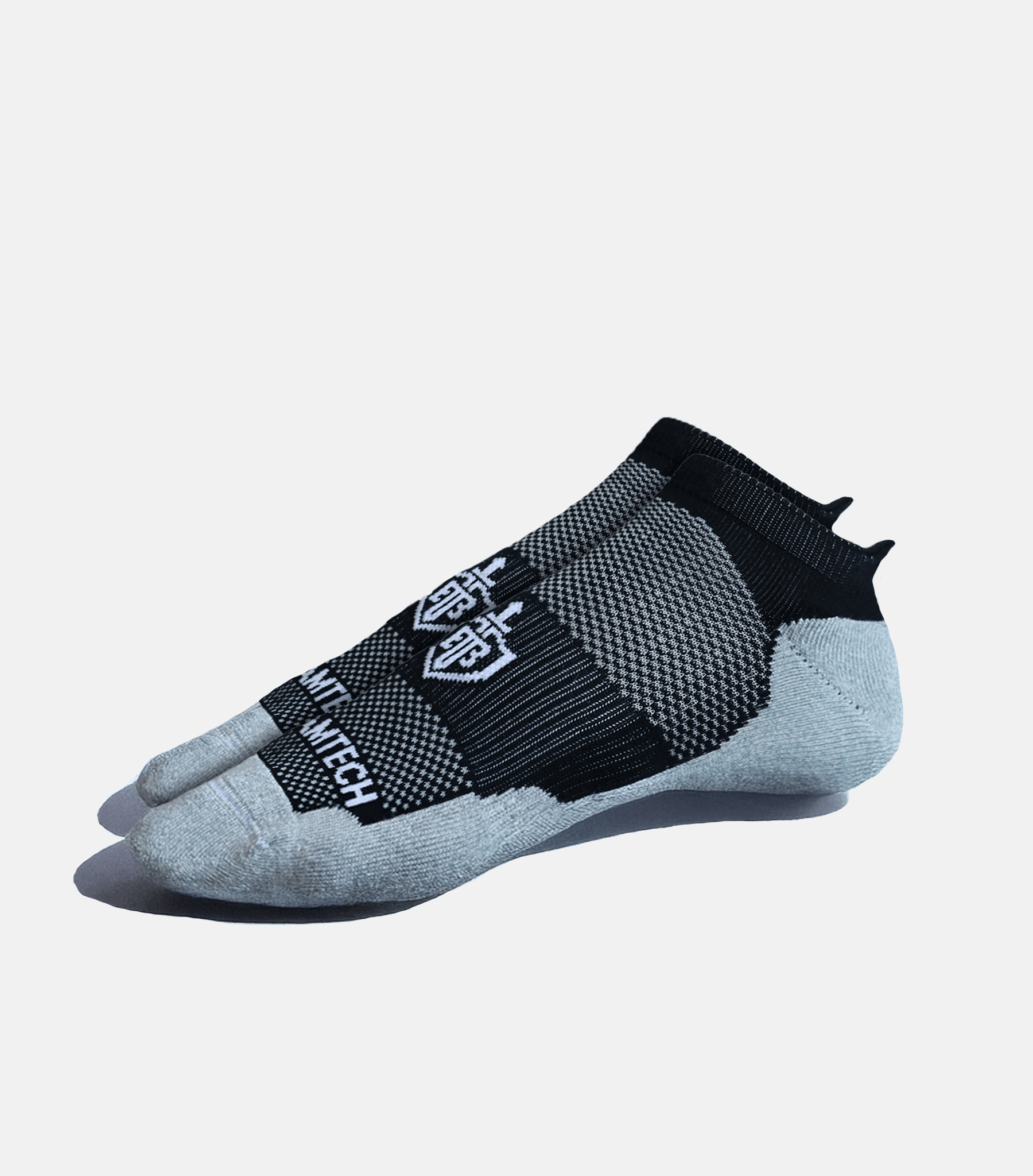 Gray ankle sock with black accents on a light gray background