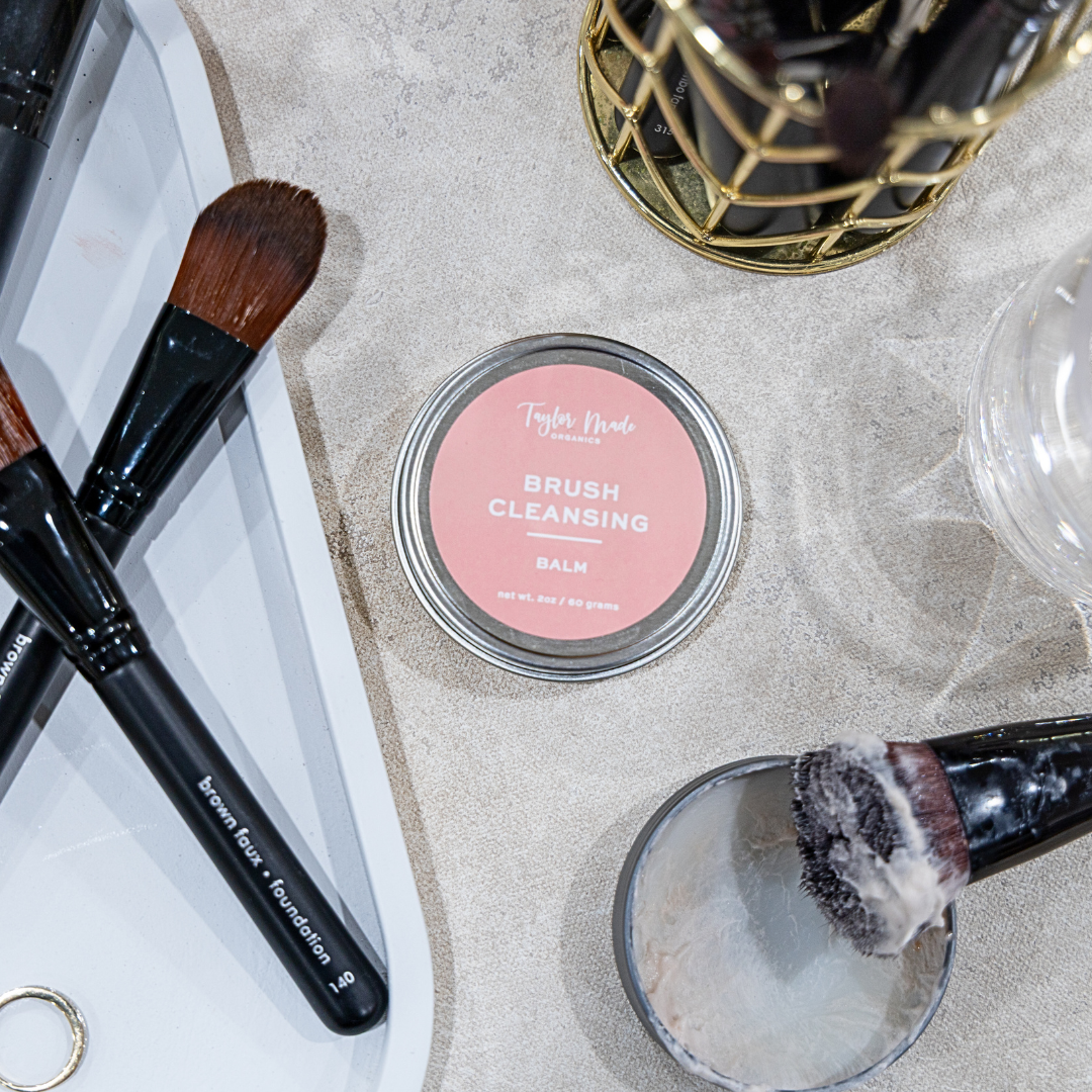 Makeup brushes with a container labeled &