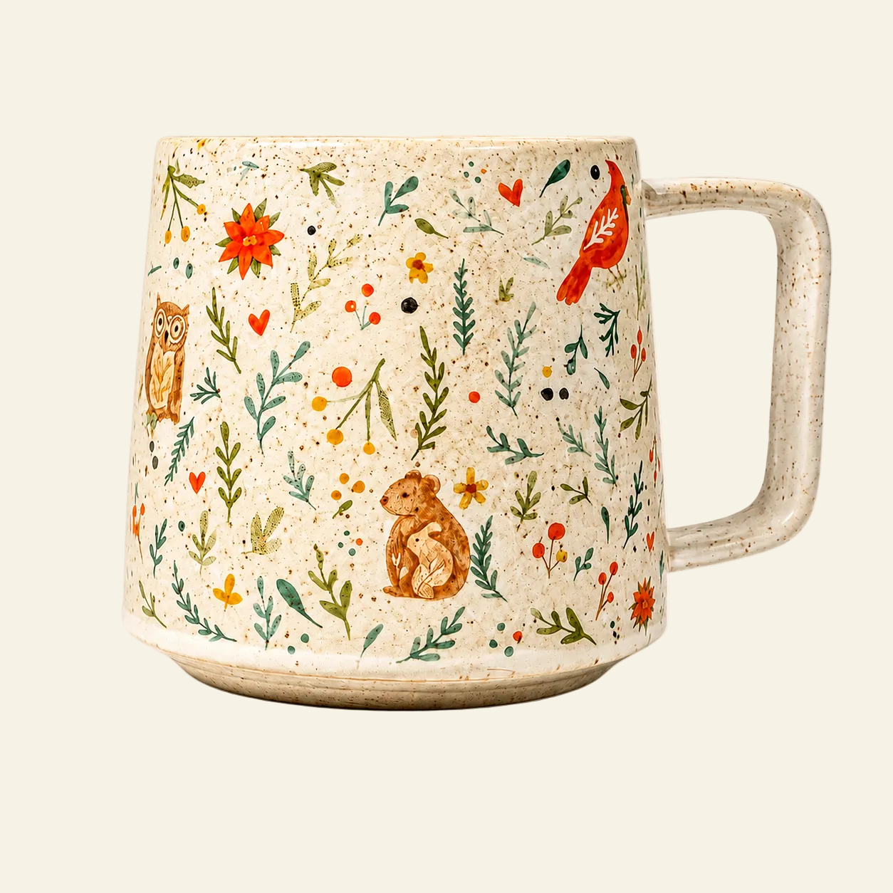 A speckled beige ceramic mug with a handle, decorated with hand-painted nature illustrations including a red bird, owl, rabbit, and wildflowers on a cream background.