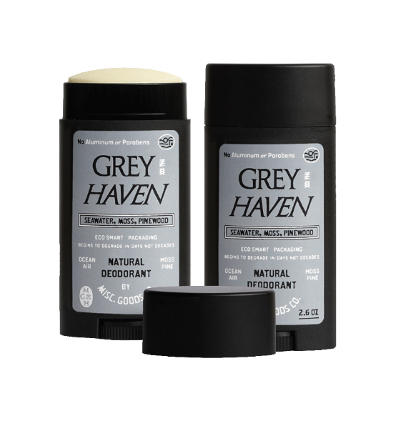 Two Grey Haven natural deodorants with black caps on a white background