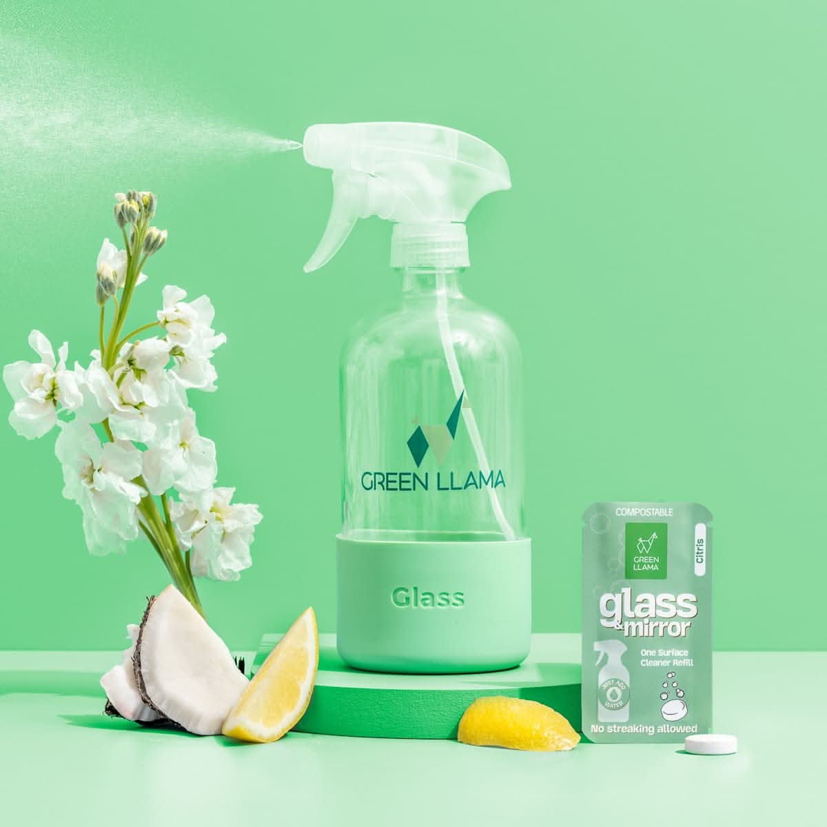 Clear spray bottle labeled &