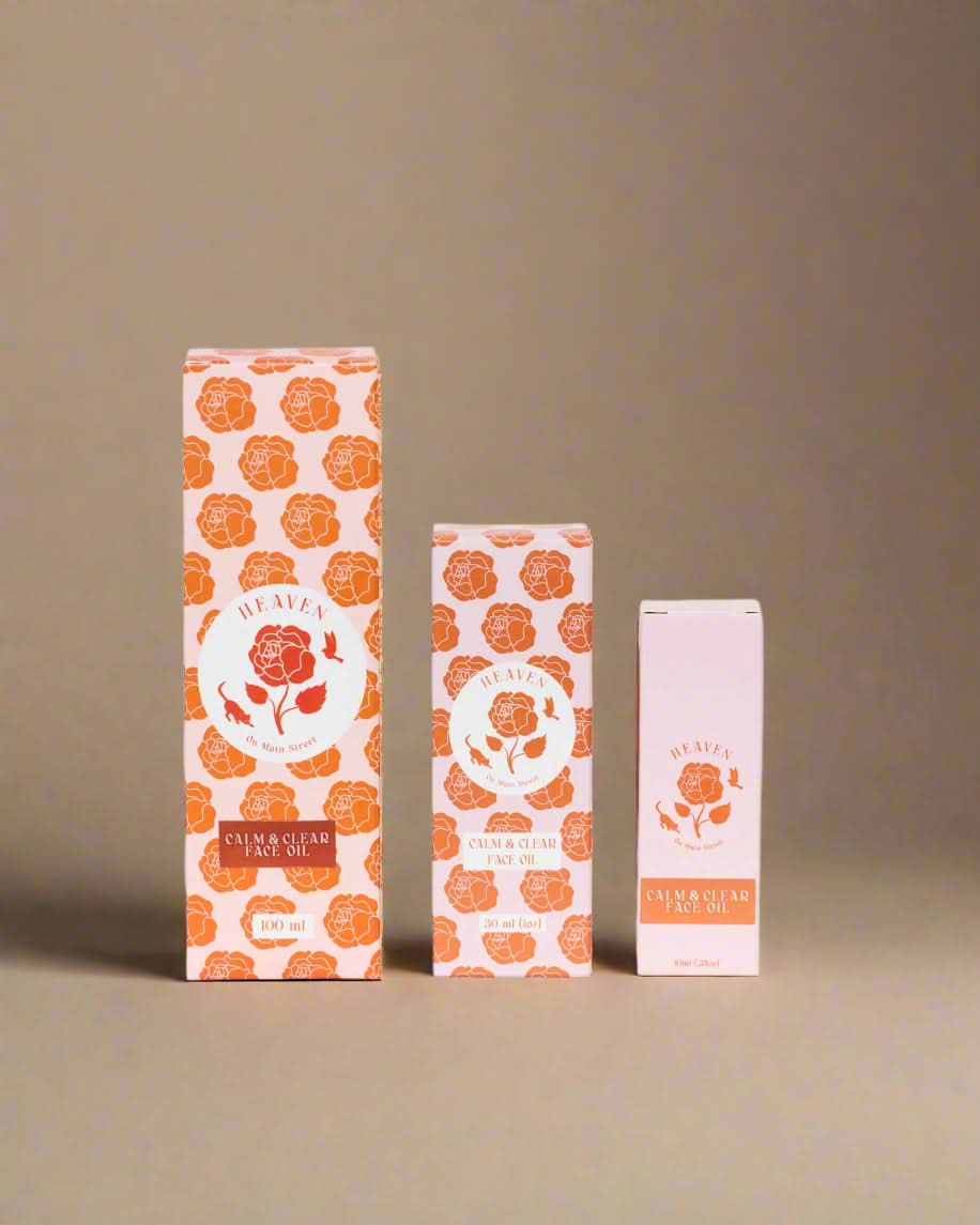 Three boxes with floral design and brand logo on a white background