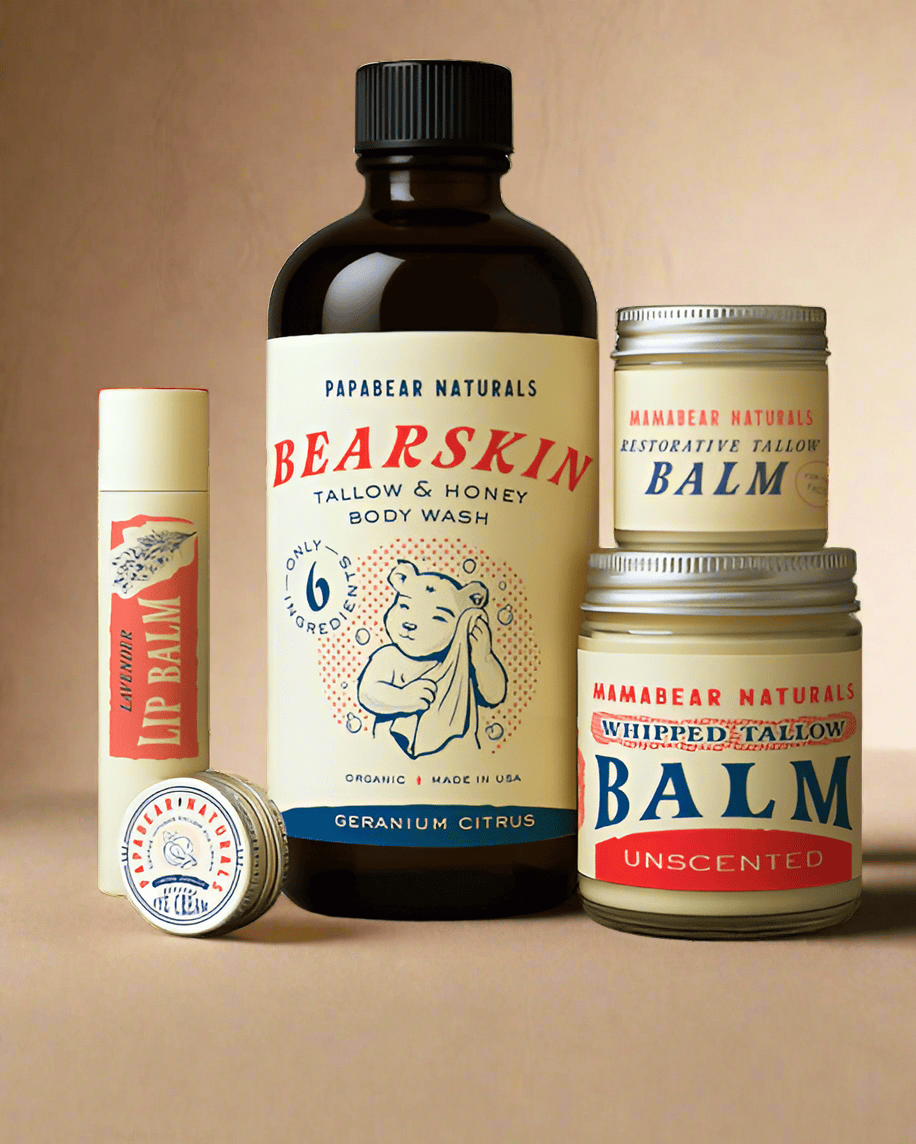 Collection of Papabear Naturals skincare products including body wash, balms, and lip balm on a white background.