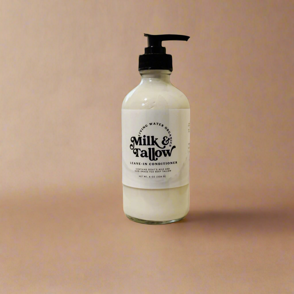 Bottle of Milk & Fallow leave-in conditioner on a beige background