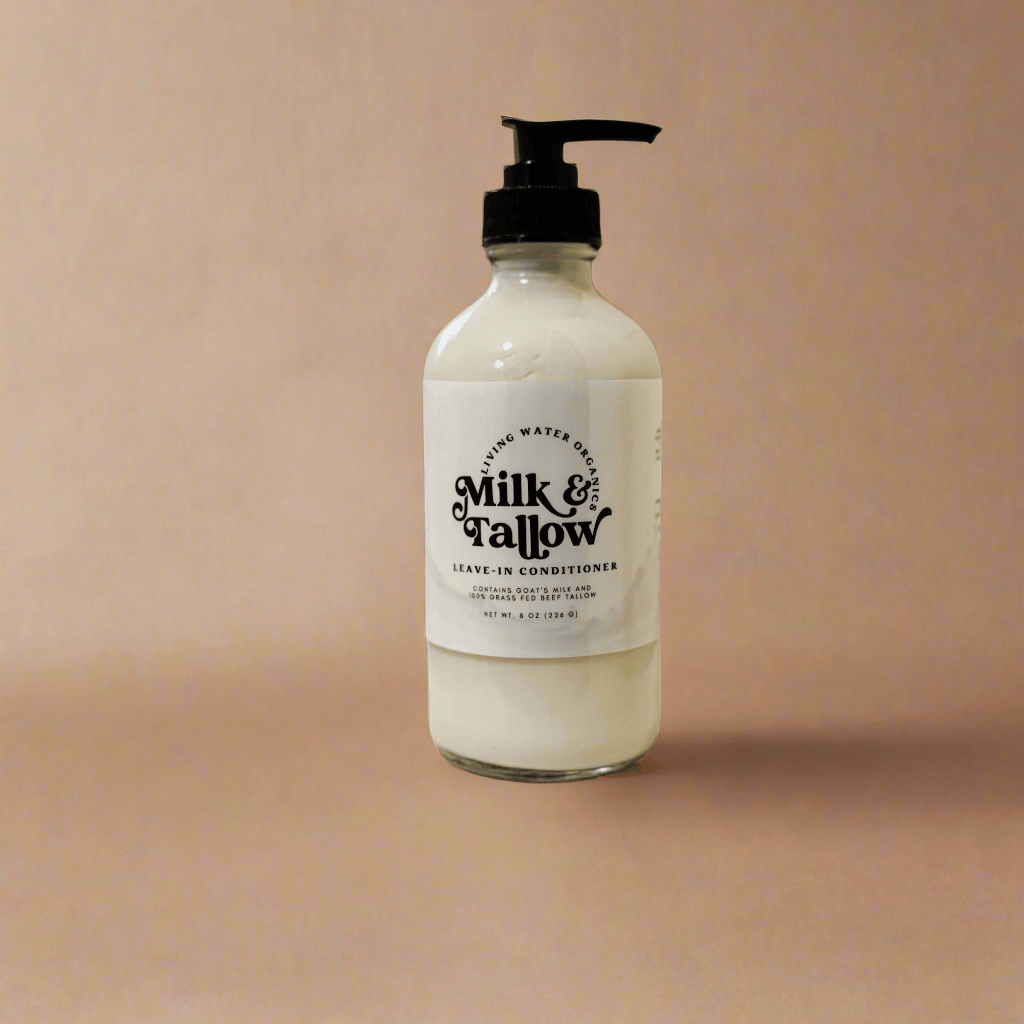 Bottle of Milk & Fallow leave-in conditioner on a beige background