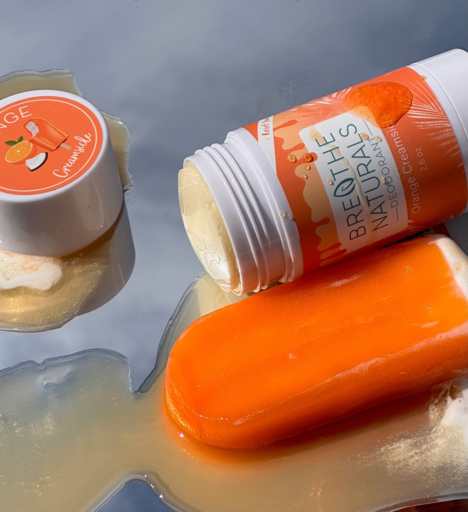 Brethel Naturals product with a bar of soap on a reflective surface