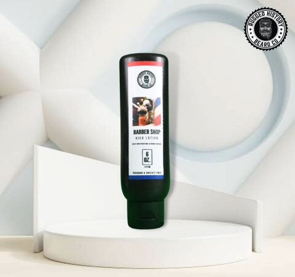 Set of six bottles of body wash with labels on a stone surface