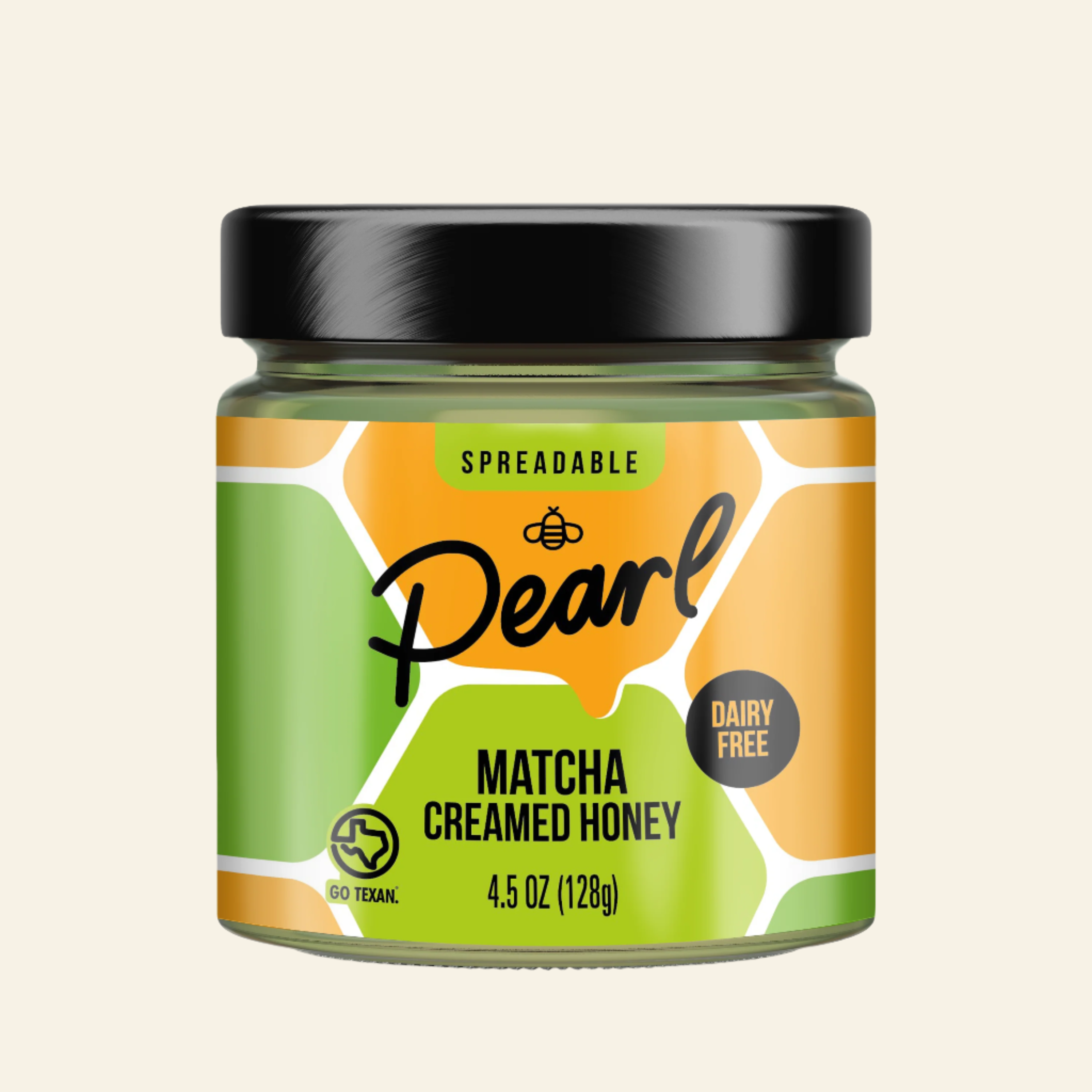 Jar of Pearl Matcha Creamed Honey with a black lid on a white background