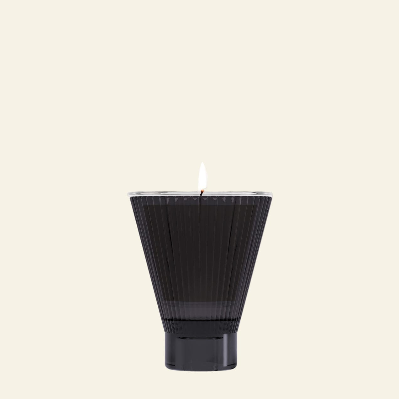 Black textured candle on a white background
