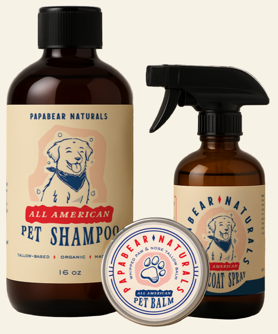 Papabear Naturals pet care product set including shampoo, coat spray, and balm on a white background