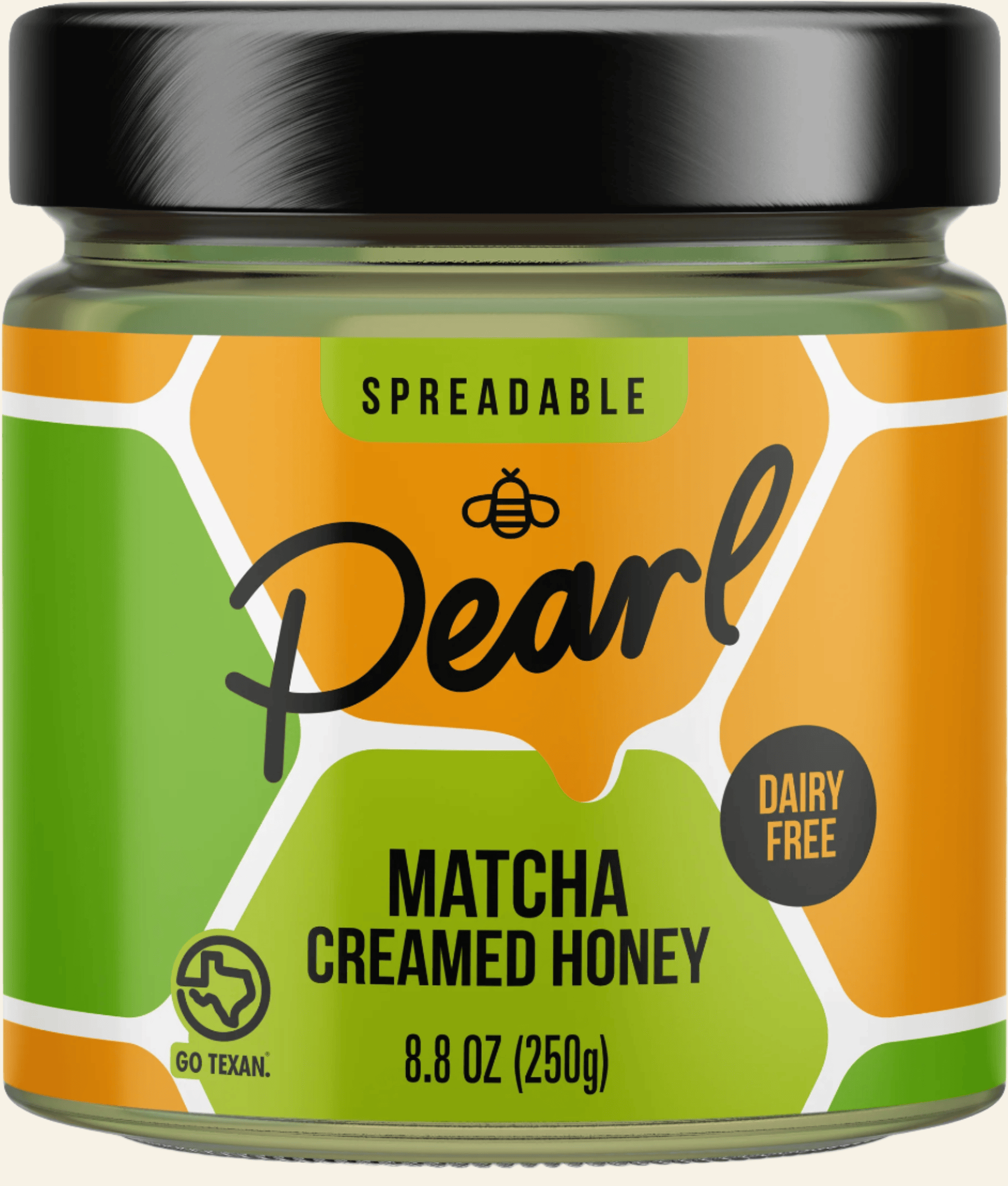 Jar of Matcha Creamed Honey with green and orange label