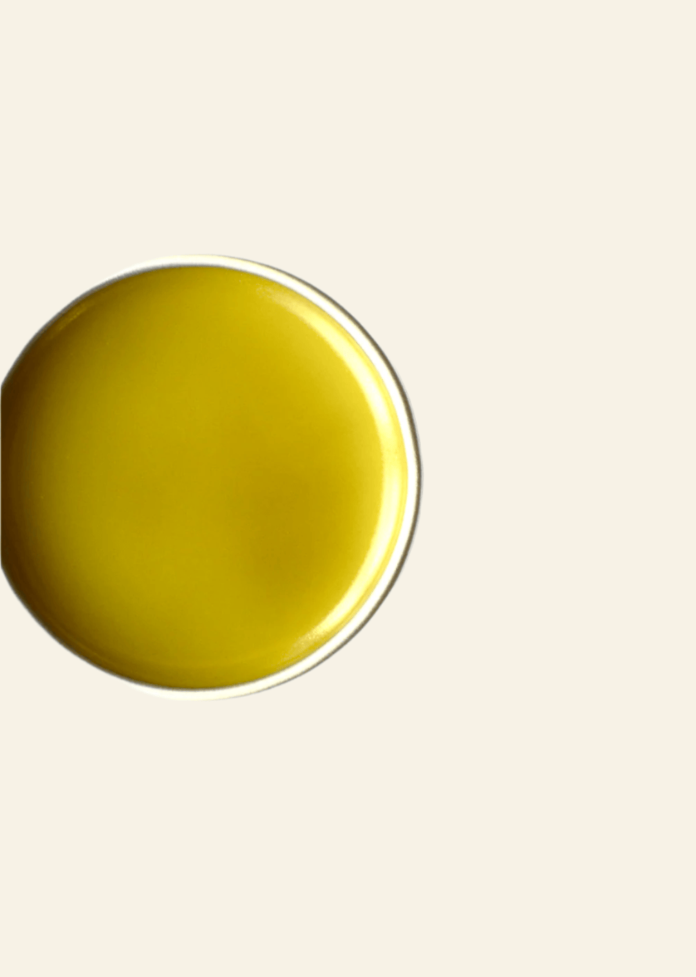 Round yellow object on a white background