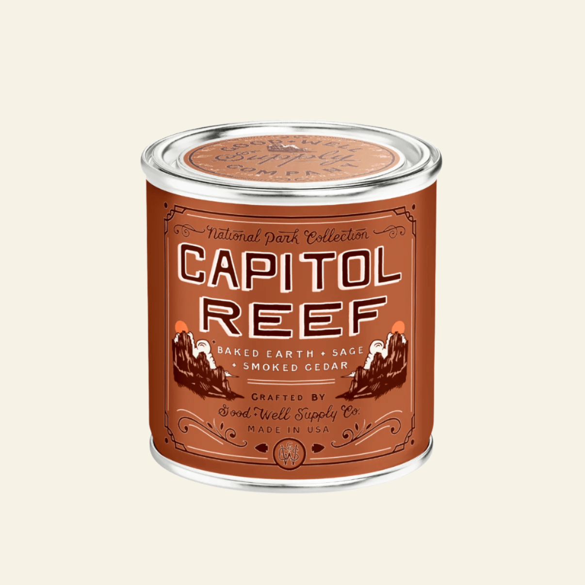 Capitol Reef candle in a tin can with decorative label on a beige background