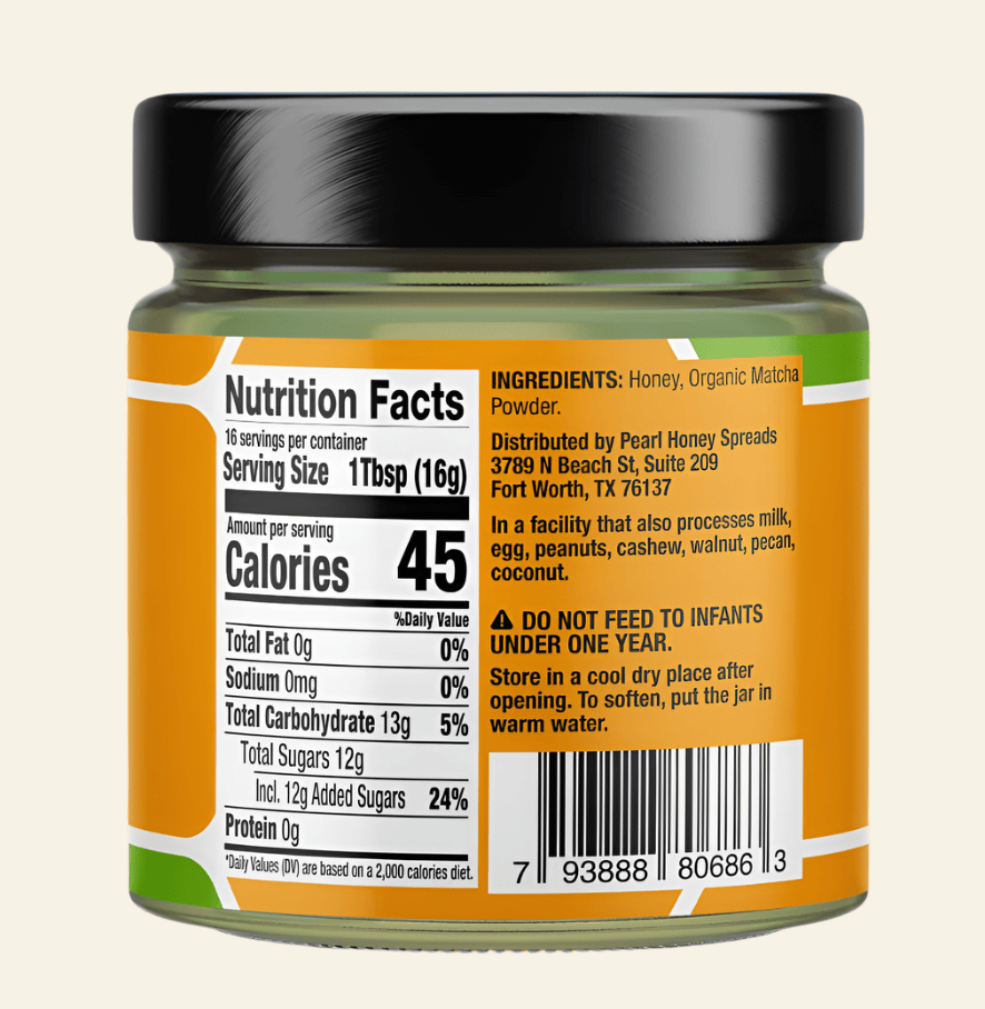 Jar of honey with nutrition label on an beige background