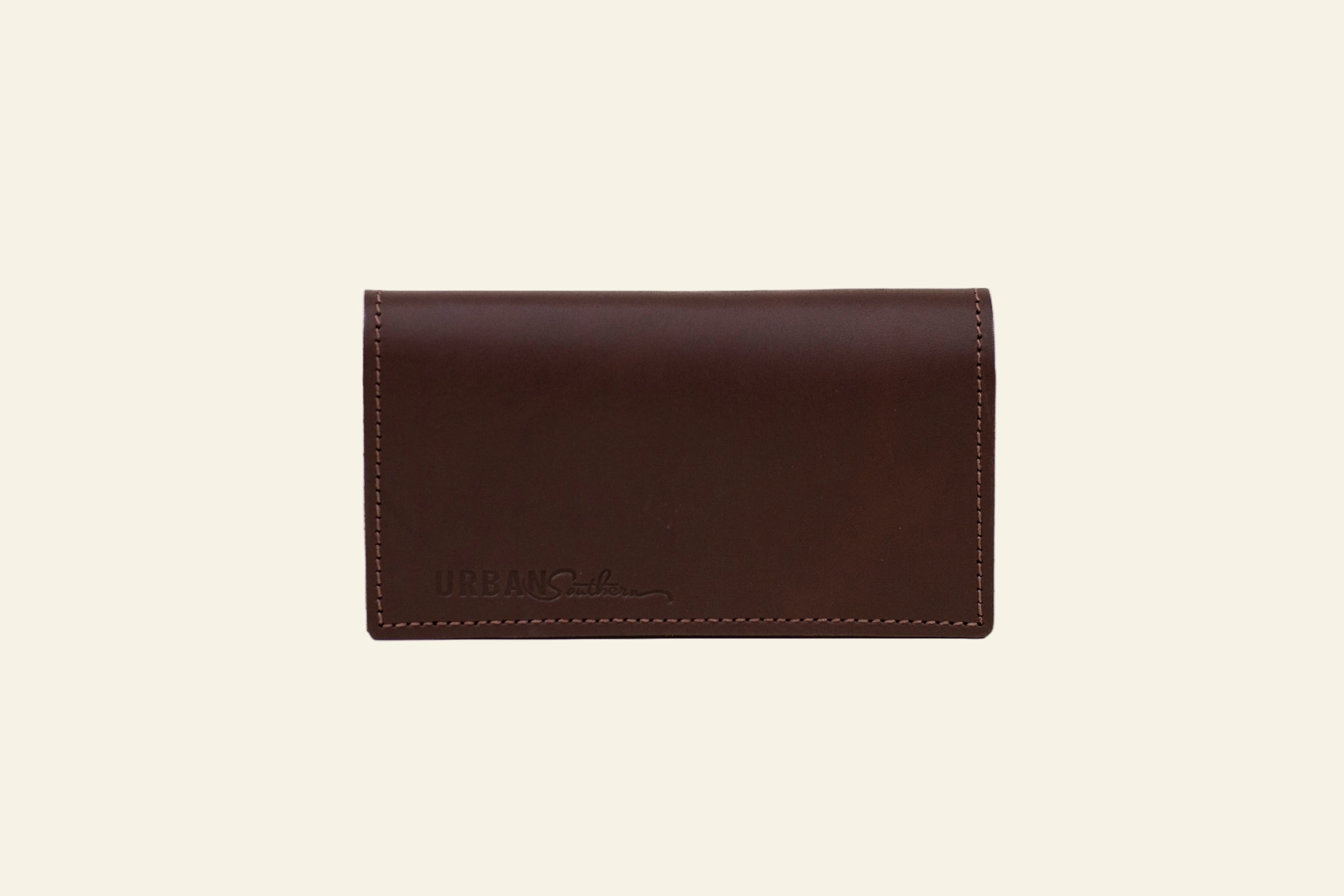 Brown leather wallet on a white background