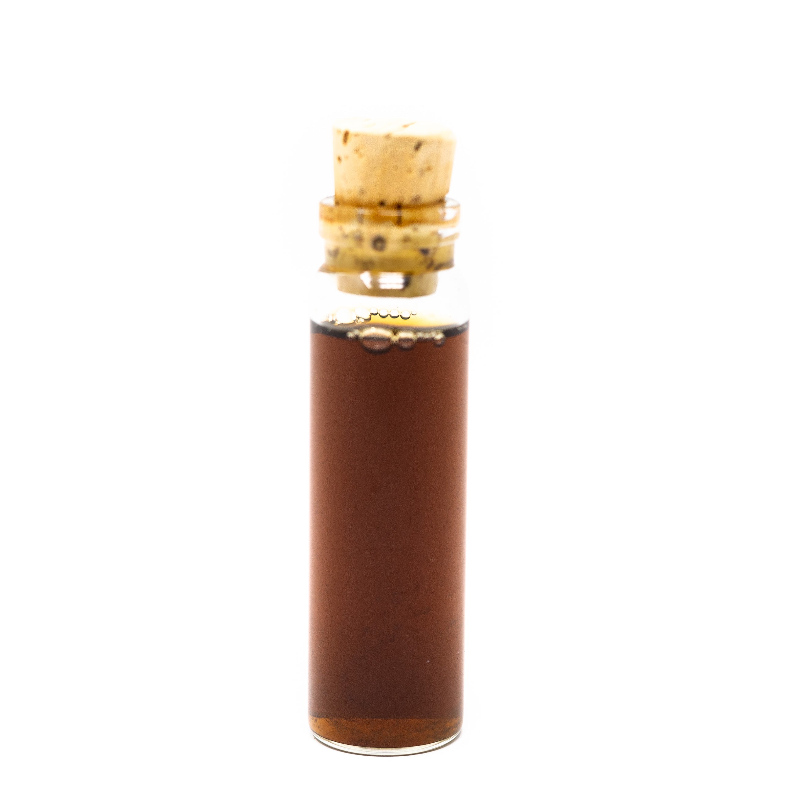 Glass bottle with cork stopper on a white background