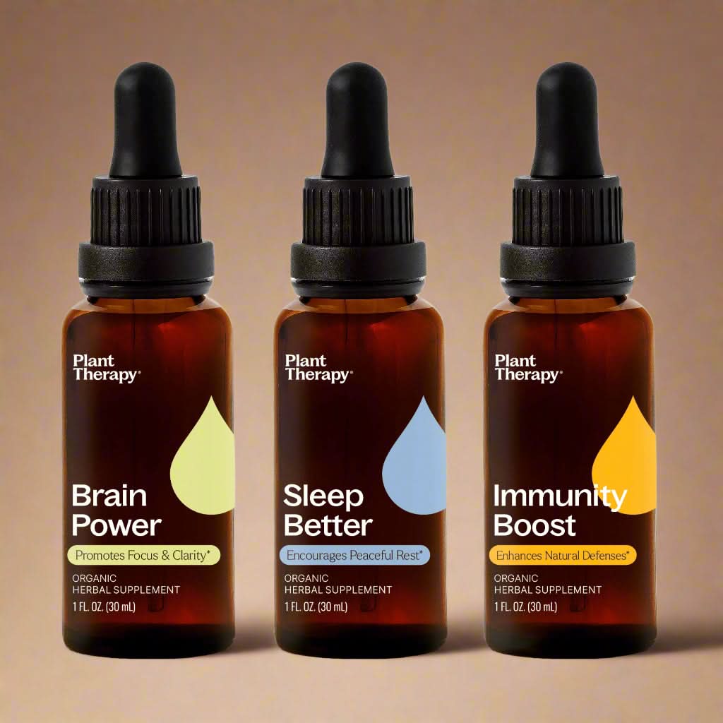 Three bottles of Plant Therapy supplements labeled &