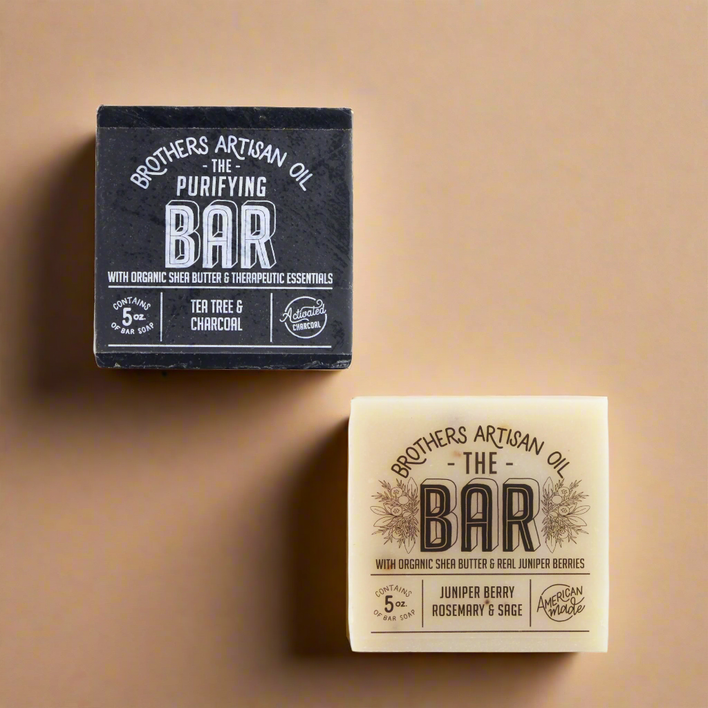Two soap bars with packaging labeled &