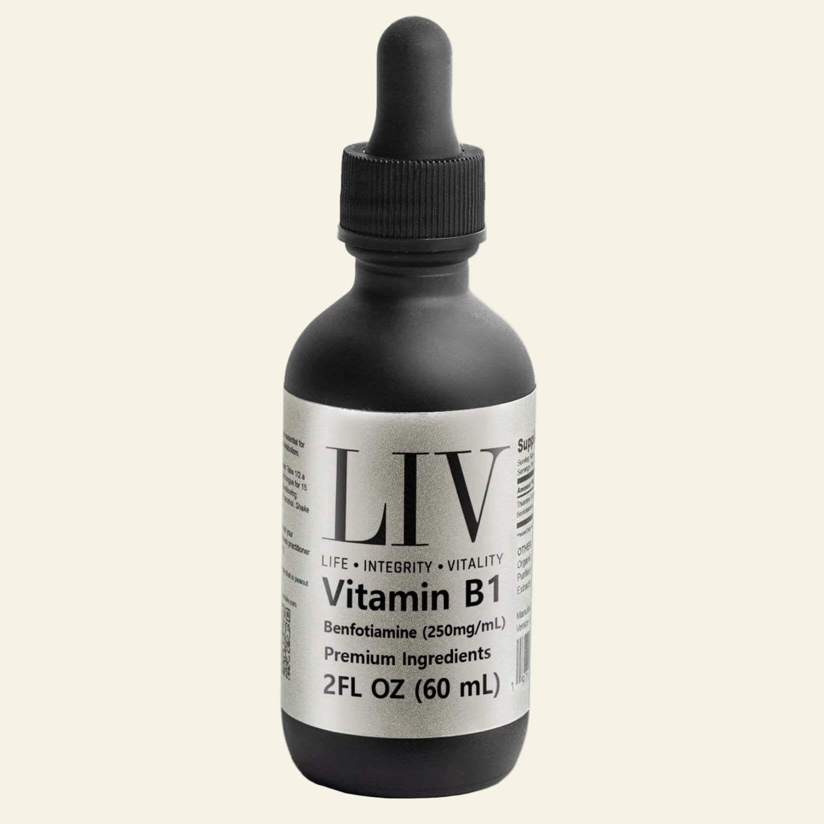 Bottle of Vitamin B1 liquid supplement with dropper labeled &