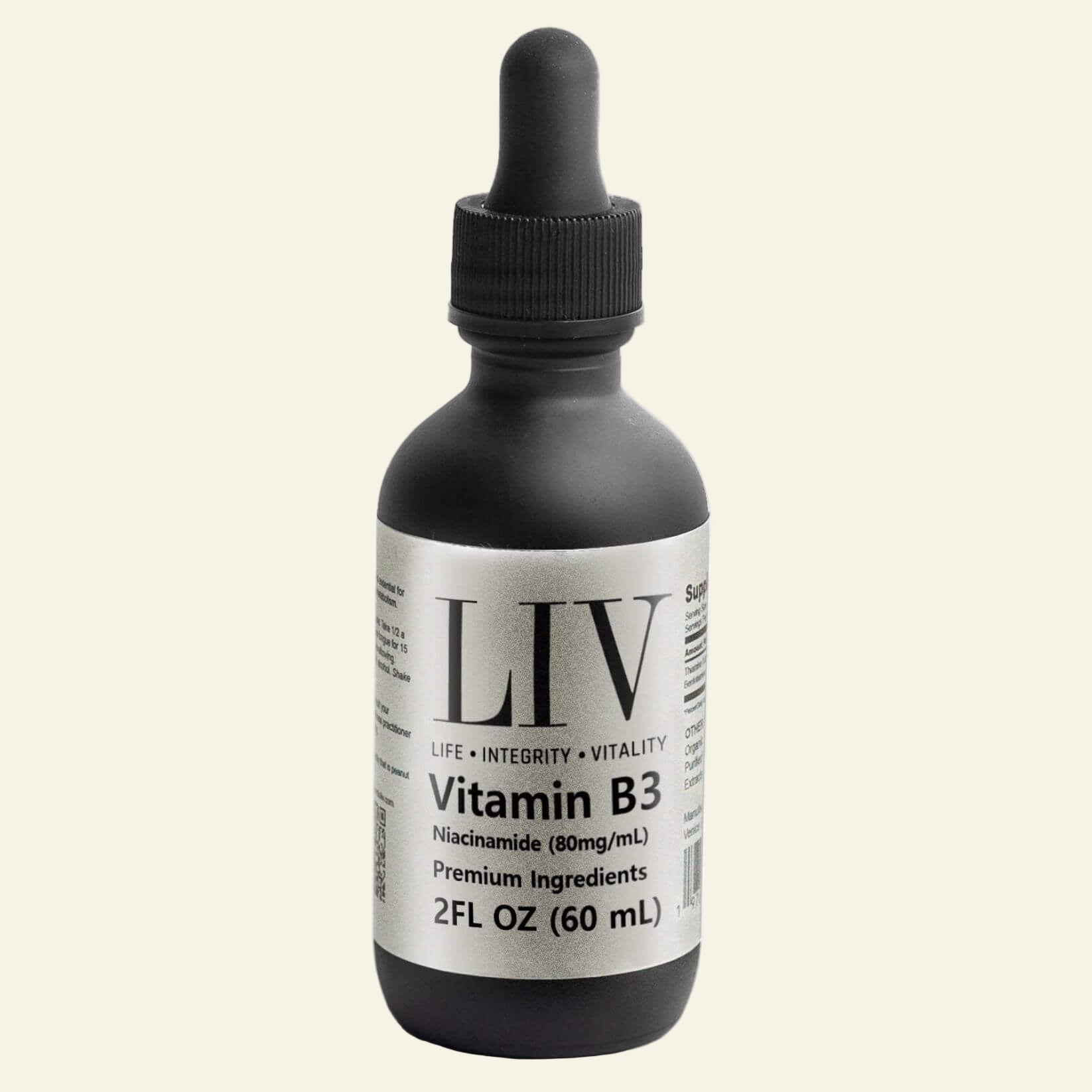Bottle of LIV Vitamin B3 with a dropper on a white background