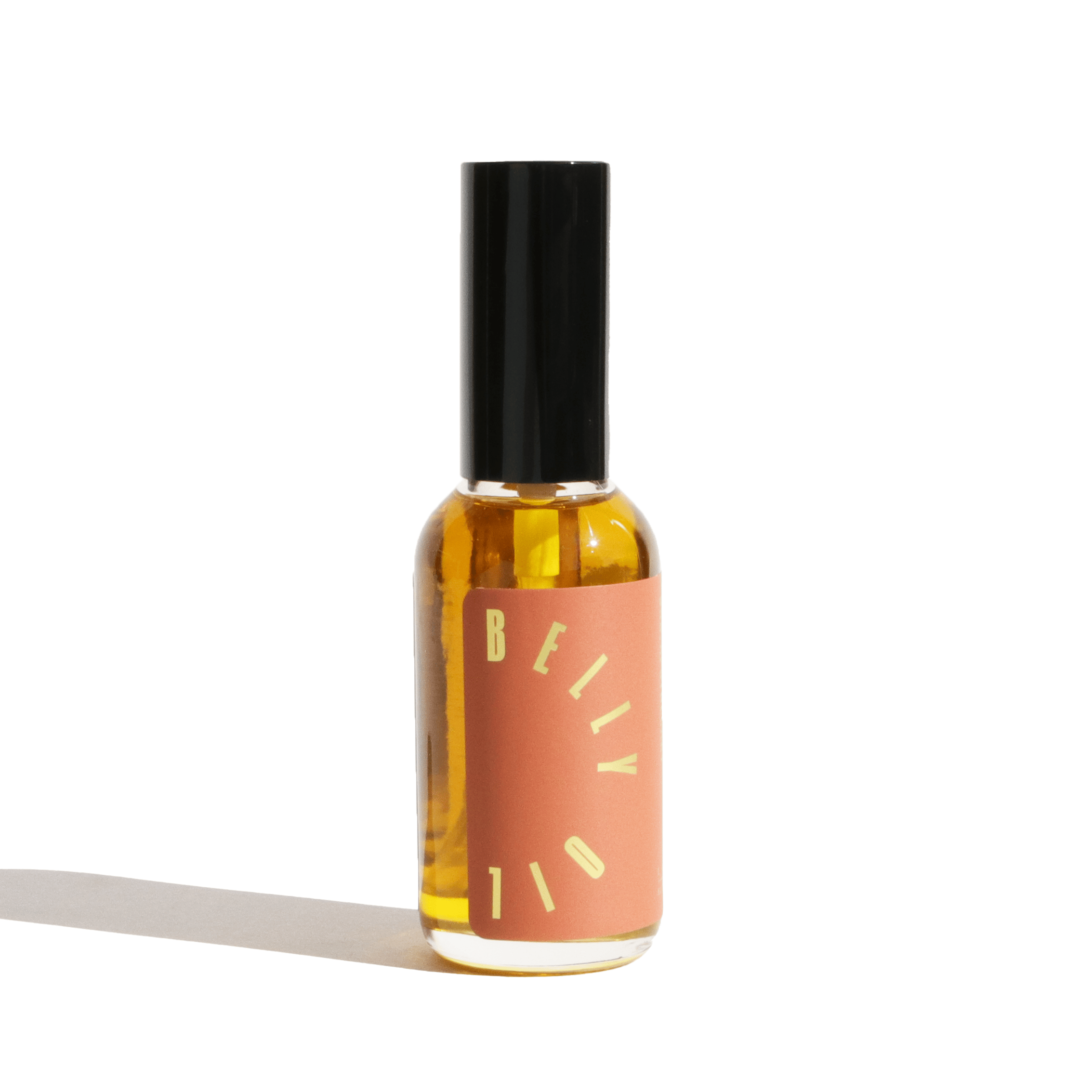 Bottle of Belly Oil with a black cap on a white background