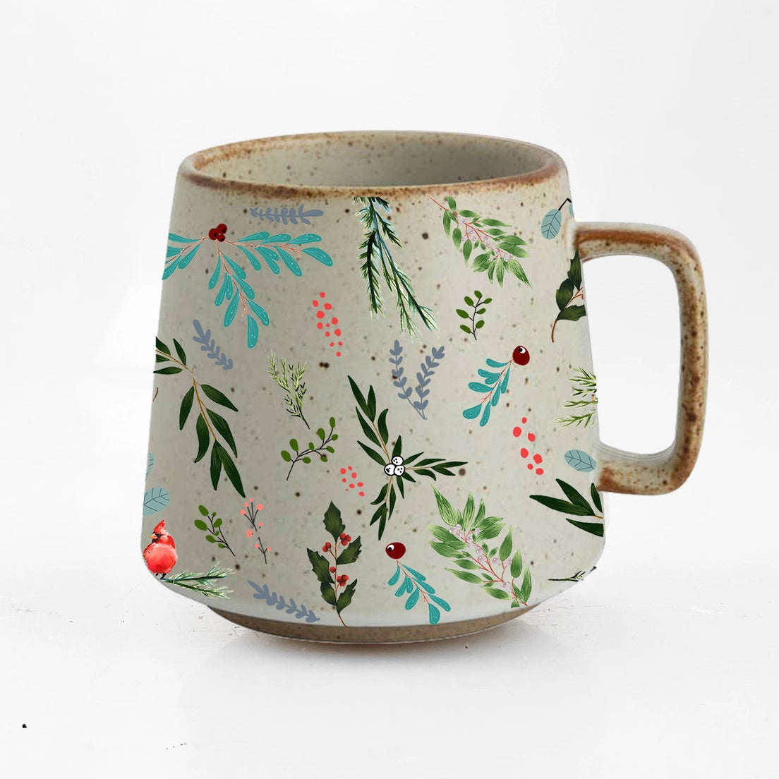 A handmade ceramic mug with a textured beige base, decorated with a colorful botanical pattern of green leaves, blue foliage, and small red berries, featuring a rustic brown handle and rim.