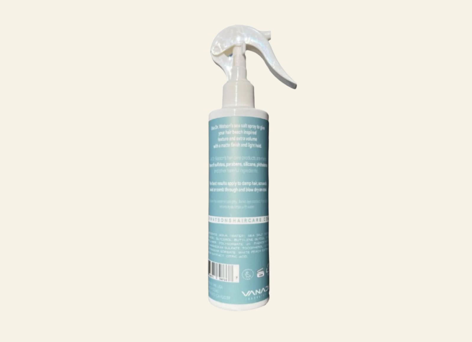 Spray bottle with a label on a white background