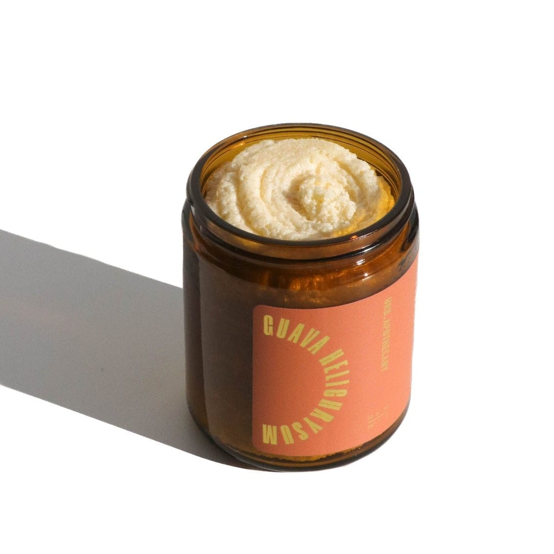 Jar of cream with a label on a white background