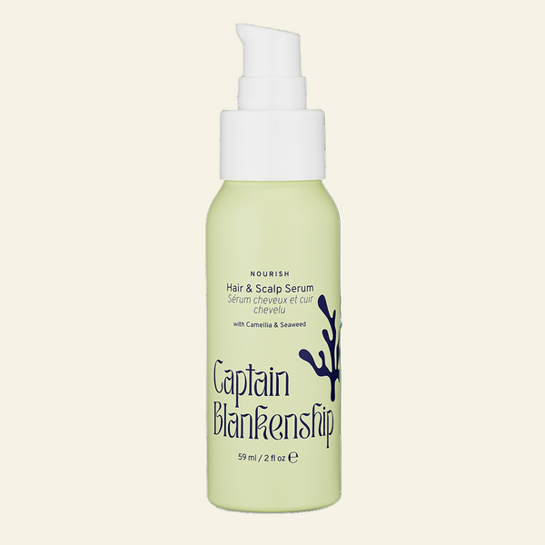 Captain Blankenstien hair and scalp serum bottle on a light beige background