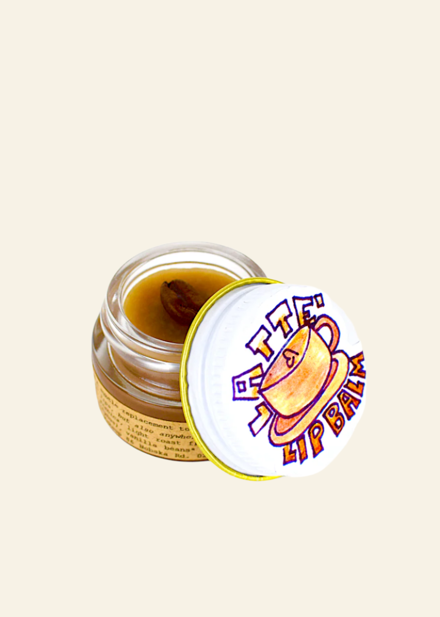 Jar of lip balm with a colorful label on a white background