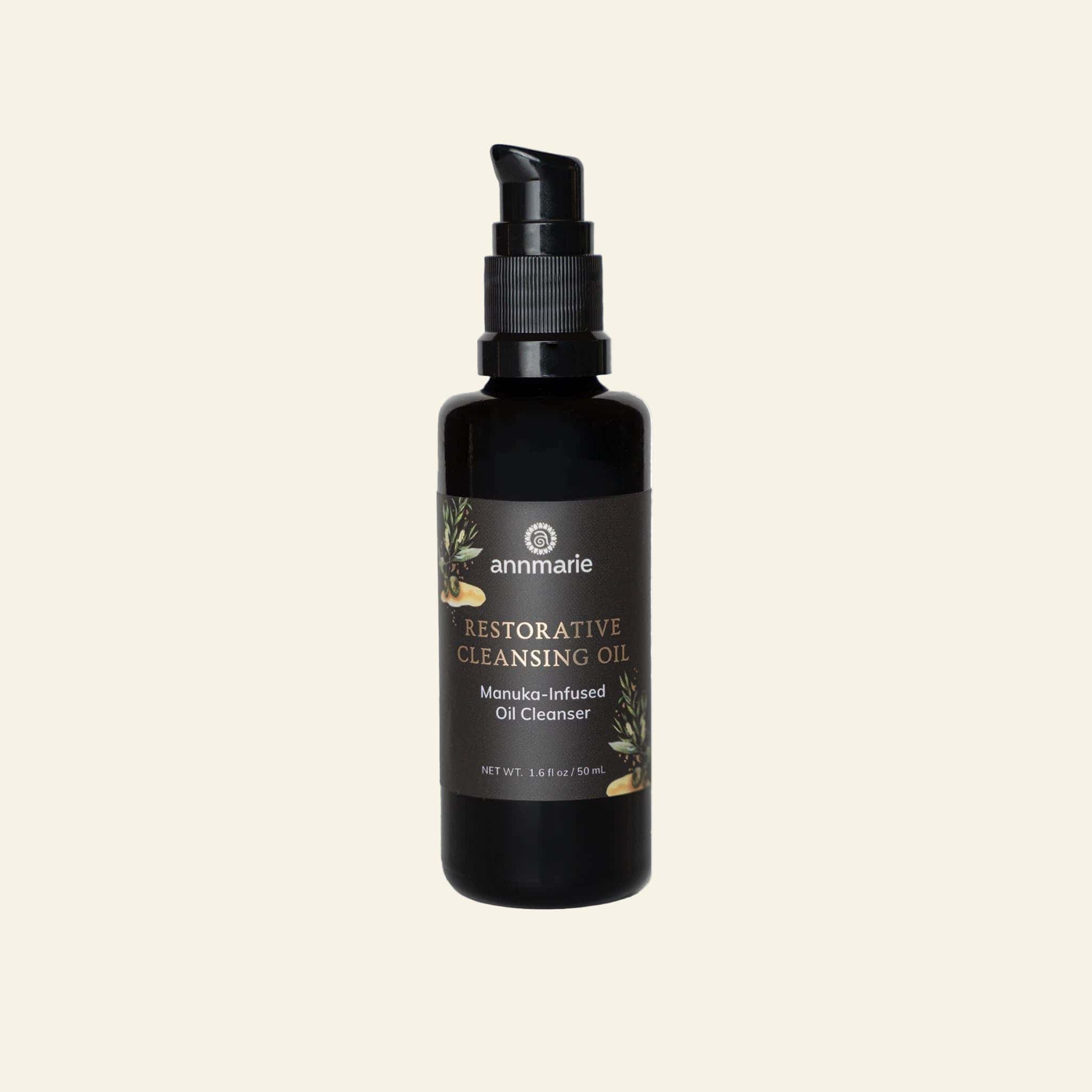 Black bottle of Annmarie Restorative Cleansing Oil on a white background