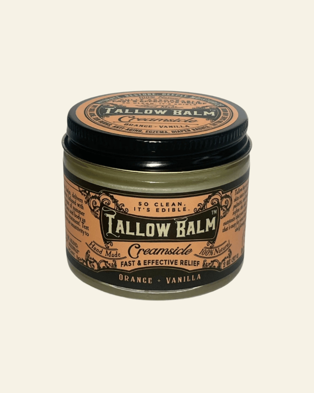 Tallow Balm jar with black lid on a white background