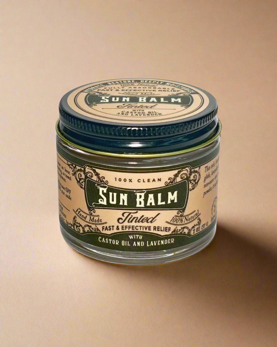 Sun Balm jar with green and beige label on a white background