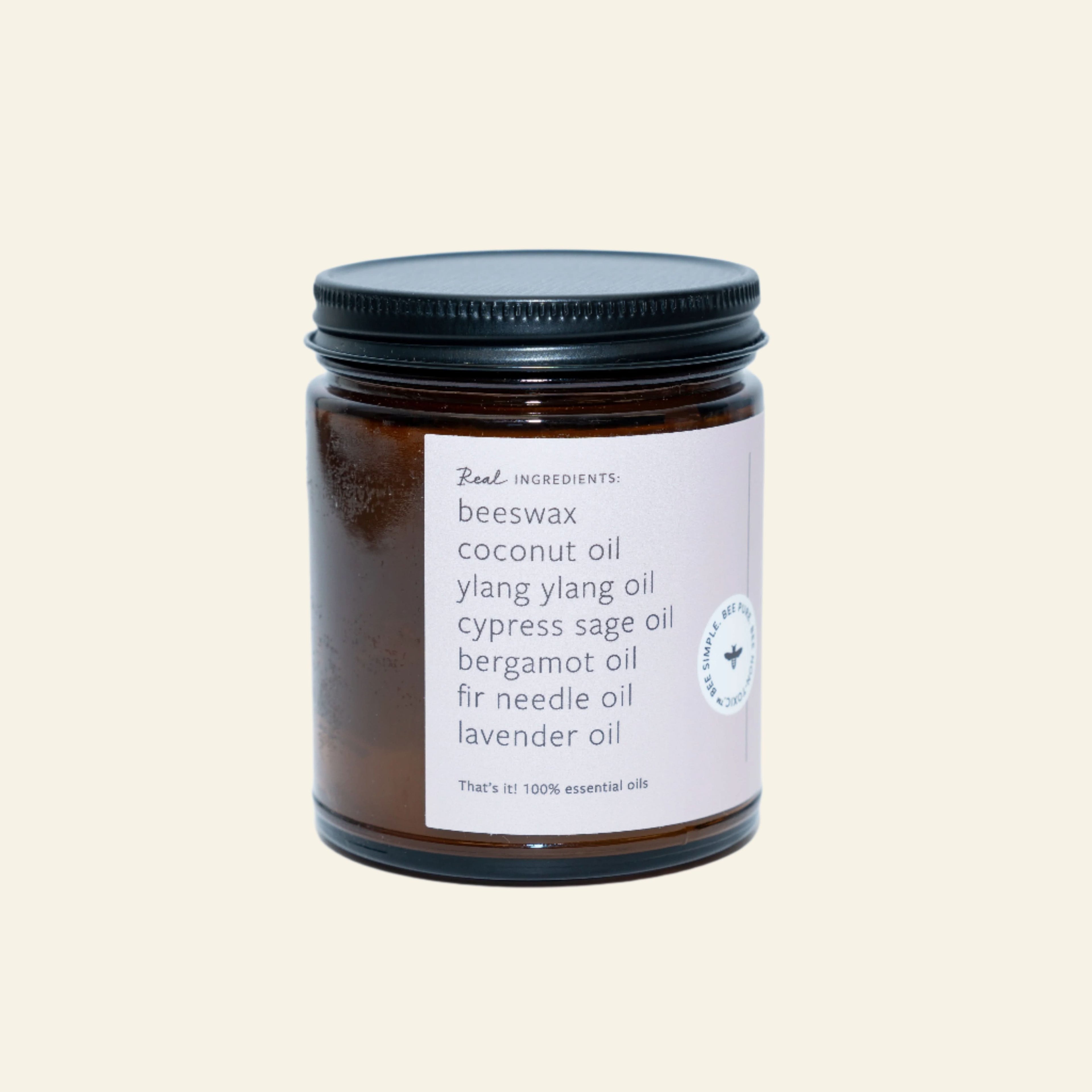 Jar of candle with a label on a white background