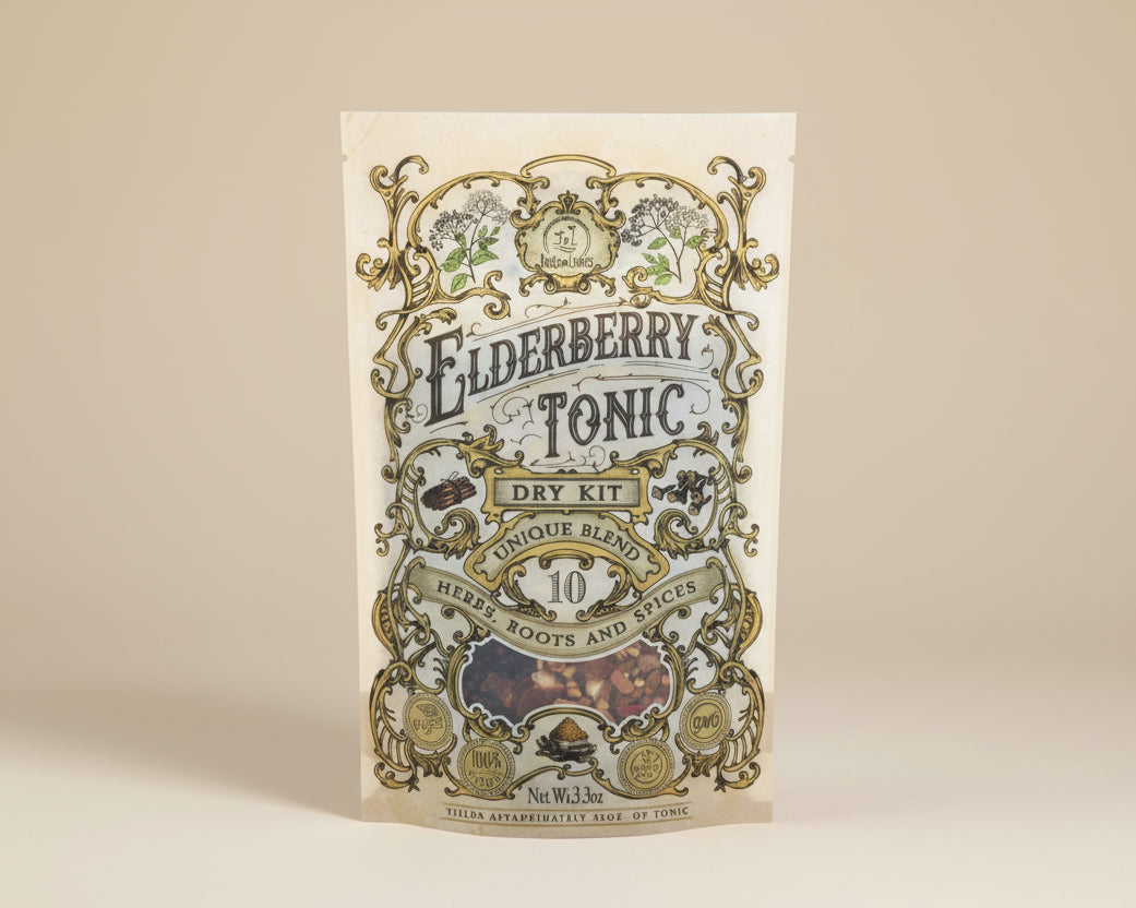 Elderberry Tonic dry kit packaging with decorative elements on a beige background