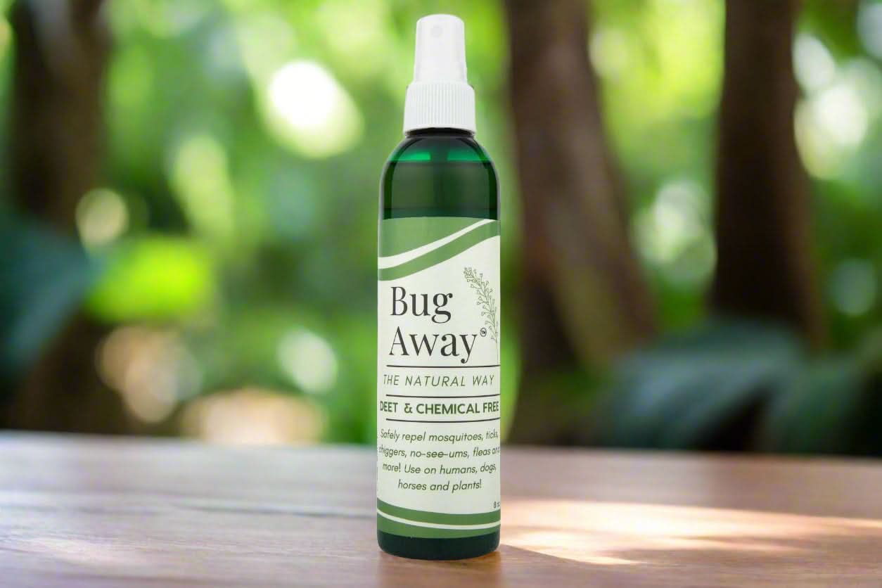 Bug Away spray bottle on a wooden surface with a blurred natural background