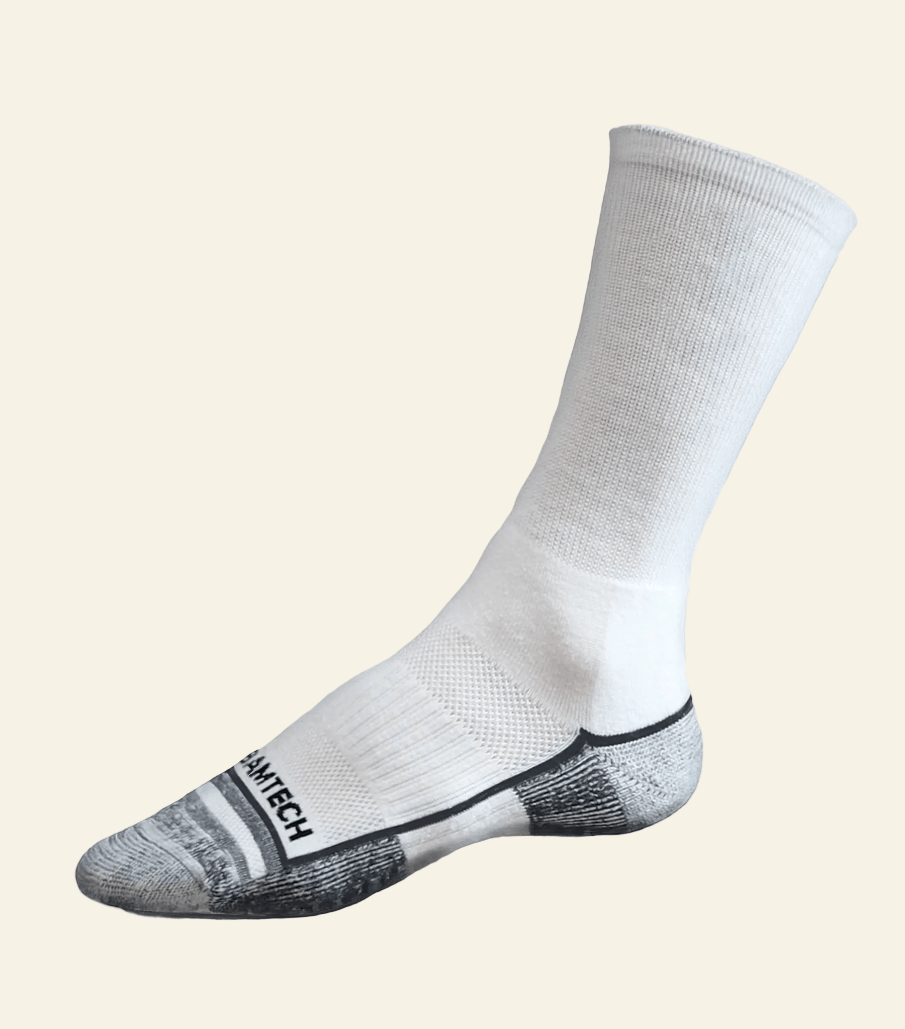 White ankle sock with black sole on a light gray background
