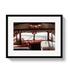Framed photograph of a vintage vehicle interior with a scenic view.