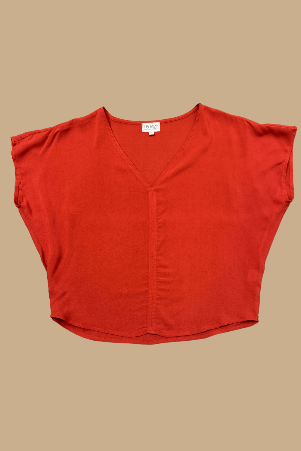 Field Day Top Dolman Top in Coral Challis