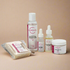 Sumbody skincare product set including toner, serum, and soap on a white background