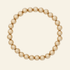 Gold beaded bracelet on a white background