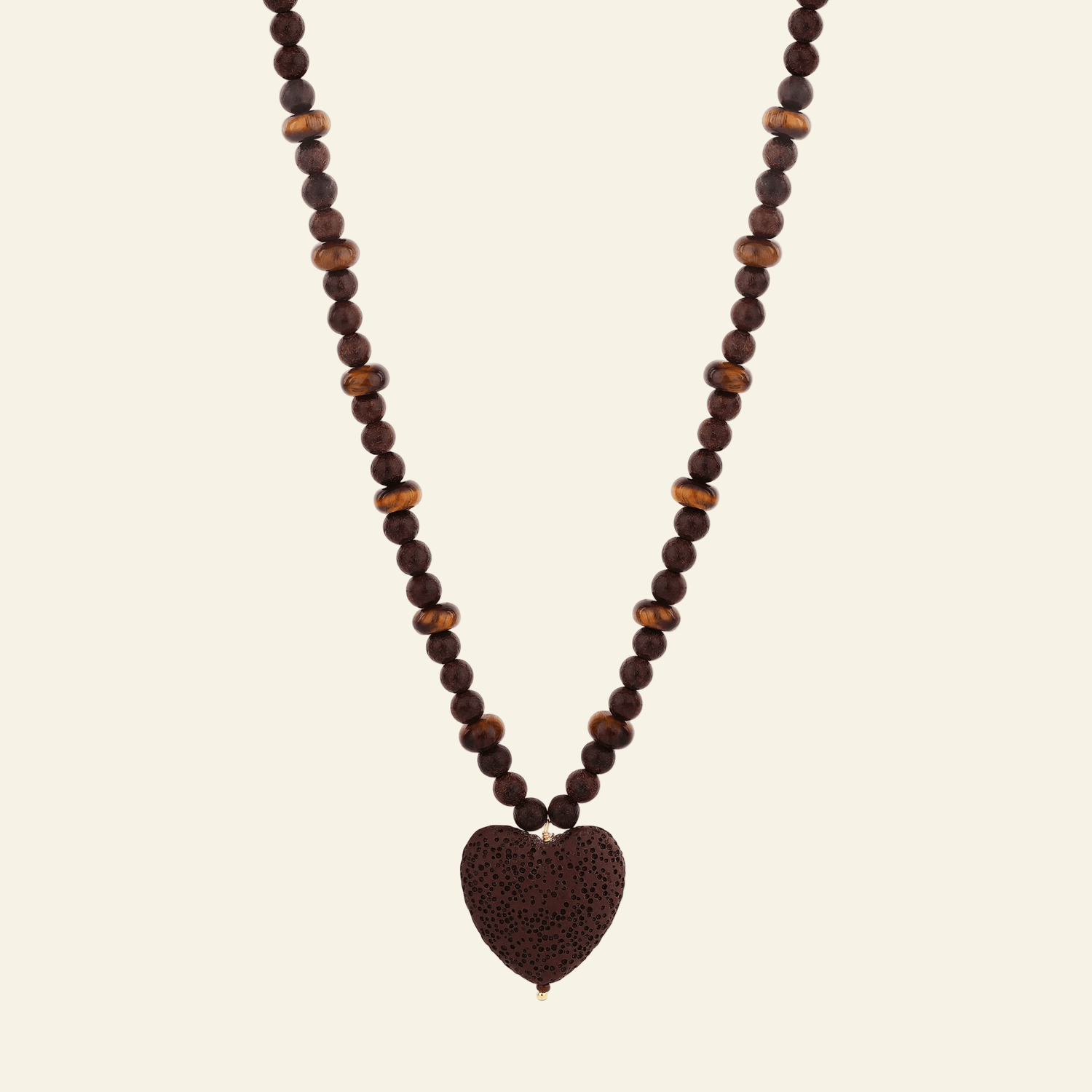 Necklace with heart-shaped brown pendant on a white background