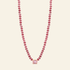 Necklace with pink beads and a pink pendant on a white background