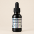 Black essential oil bottle with dropper labeled &